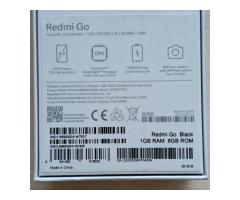 Смартфон Xiaomi Redmi Go + чехол, стекло, карта памяти