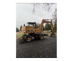 Услуги экскаватора универсального  CASE 488 P